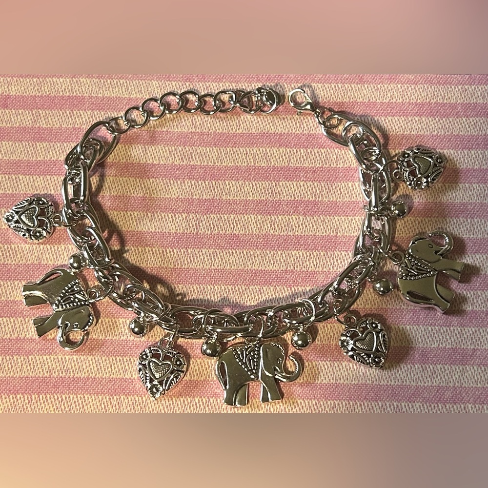 Silver-toned elephant and heart charm bracelet